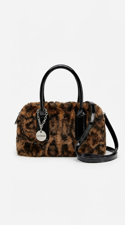 Bolso Coconuda animal print de mano y bandolera