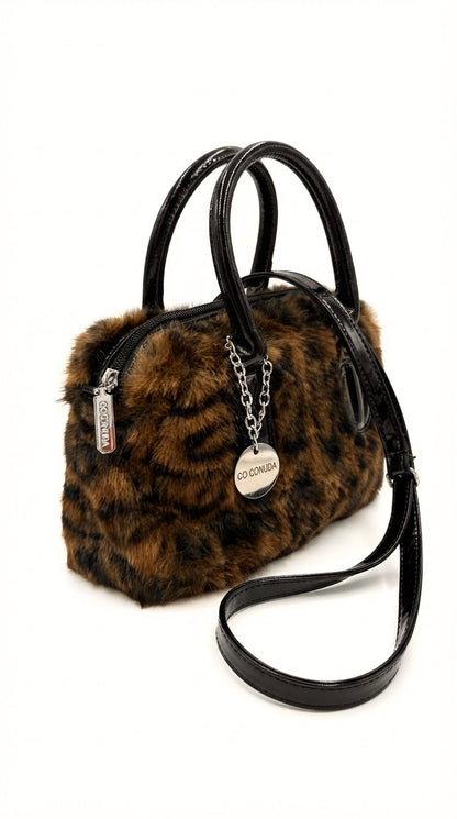 Bolso Coconuda animal print de mano y bandolera